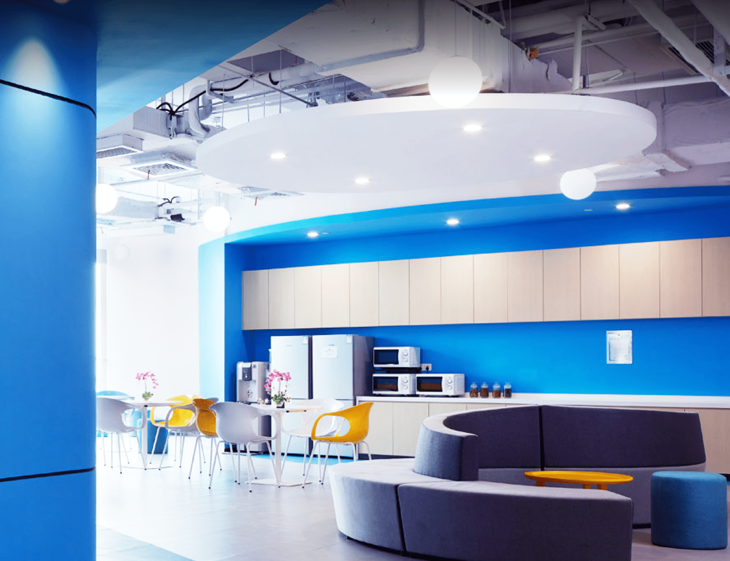 The bright blue Hellobike operations office interior